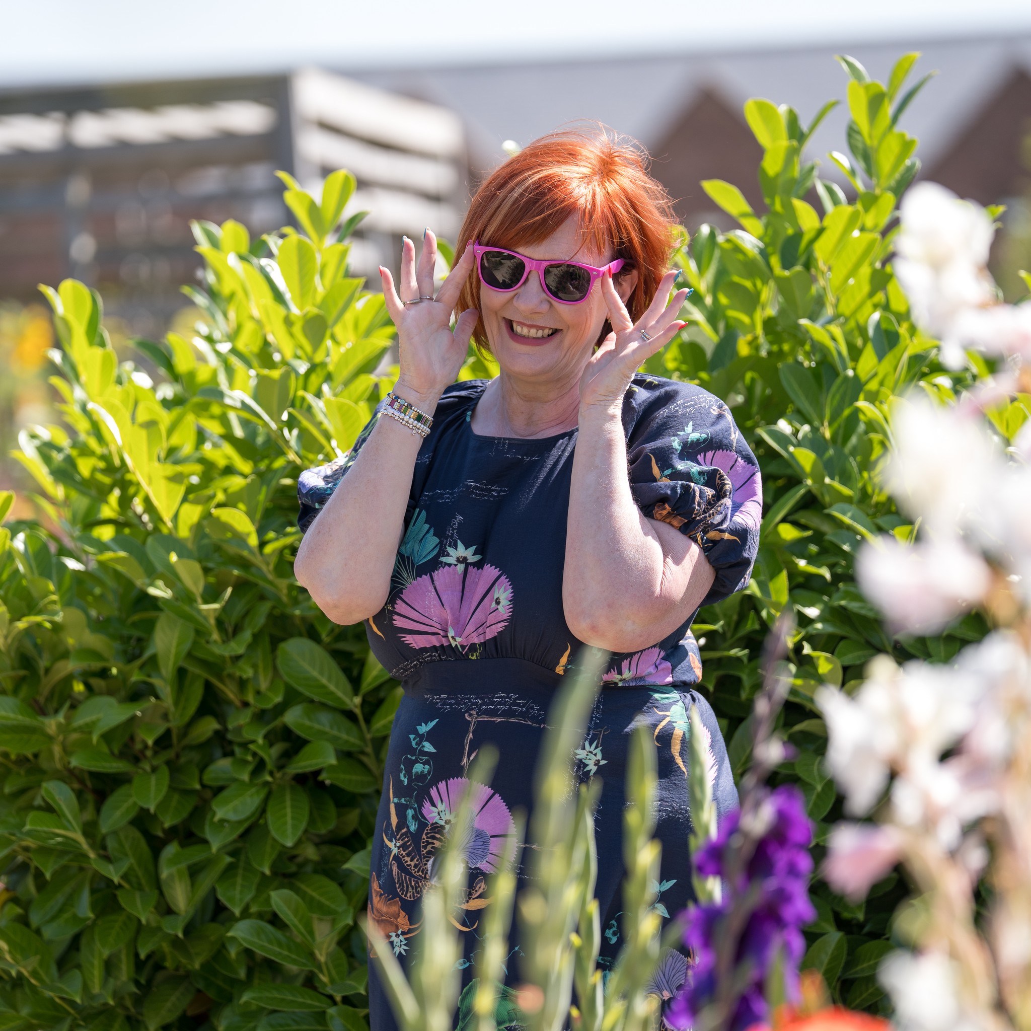 Creative business owner photographed in a garden