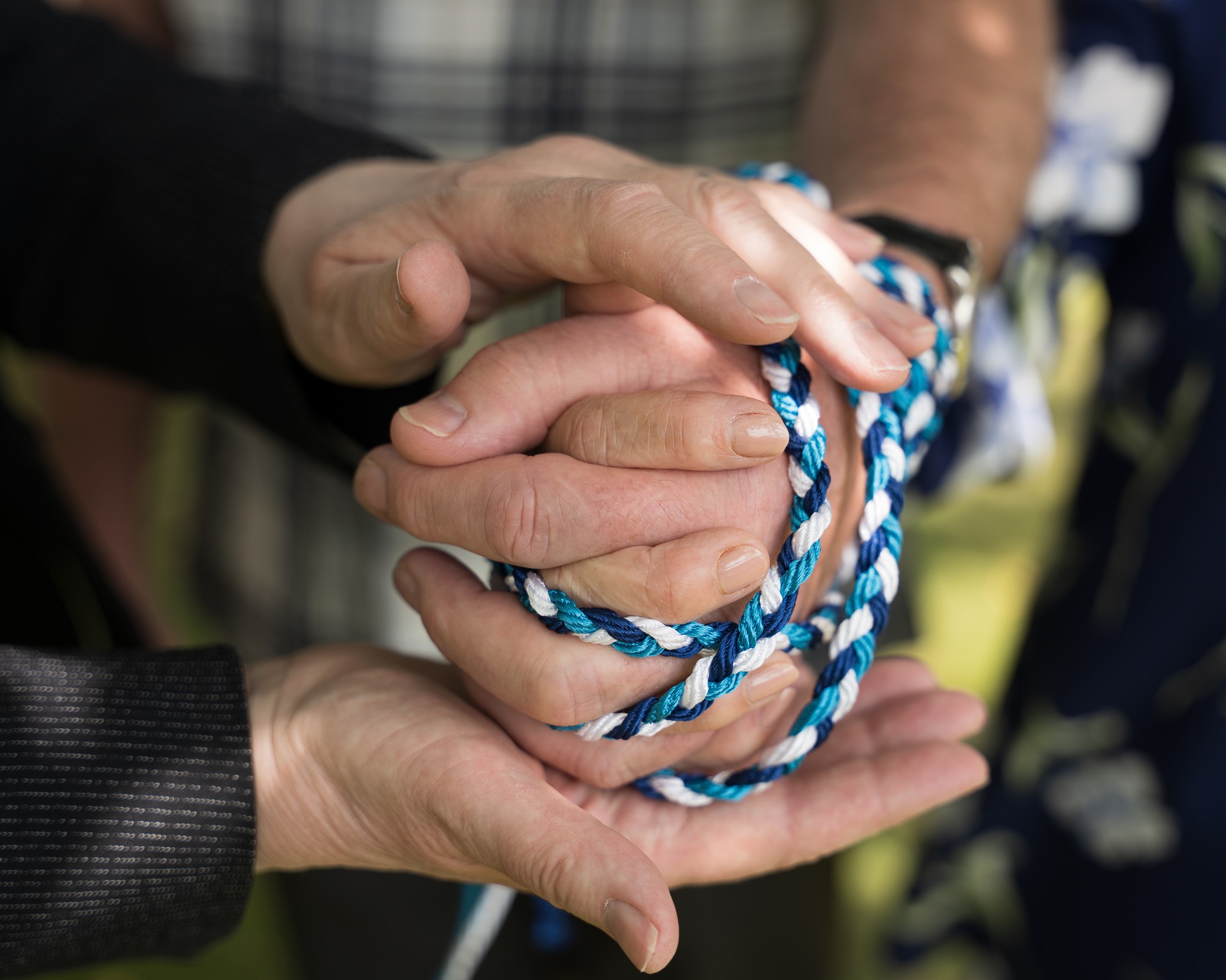 Hands demonstrating a service during a brand shoot